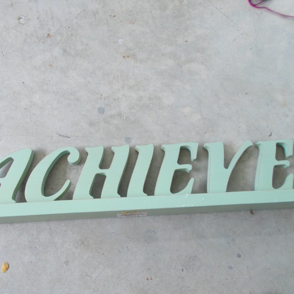 EUC Stand up wood Achieve sign